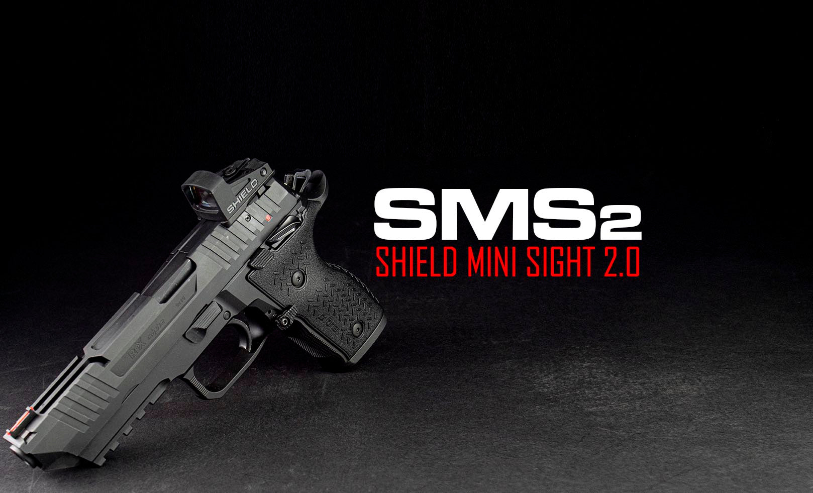 Black red dot sight mounted on pistol SMS 2.O text